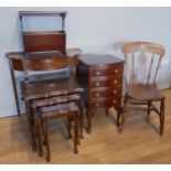 A mahogany serpentine four height chest of drawers, together with a nest of three tables, a mahogany