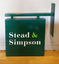 A 'Stead & Simpson' shop frontage sign, painted steel construction. W71cm, H84cm.