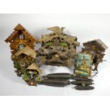 Three mechanical mid 20th Century cuckoo clocks, for spares or repair.