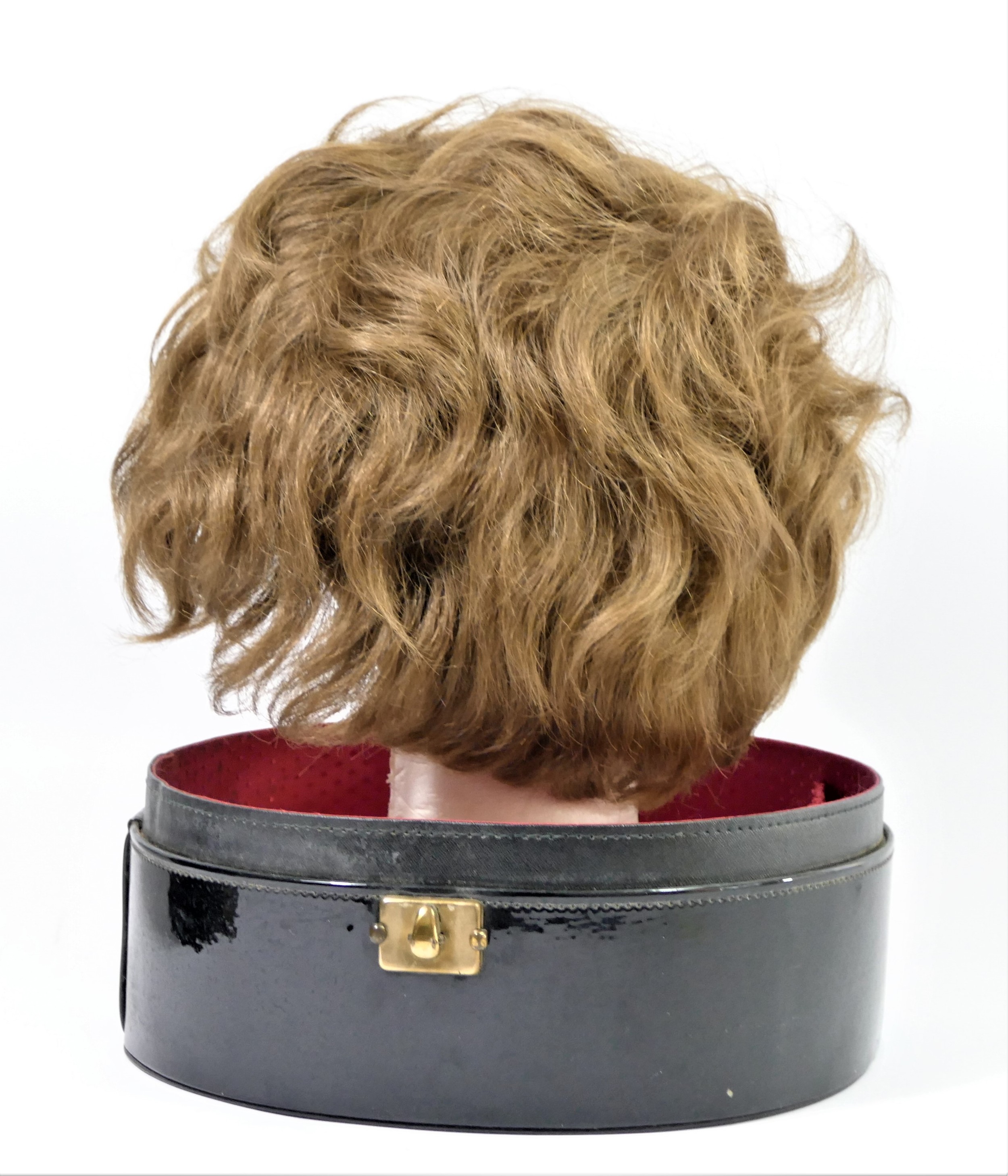 Short, mid brown 1960's style wig in a black patent travel case , 35 x 27cm. - Image 2 of 4