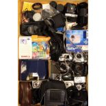 A collection of film cameras, to include brands such as Polaroid, Nikai, Akita, Minolta, Canon,