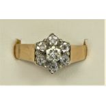 A 9ct gold and illusion set diamond cluster ring, N, 2.9gm