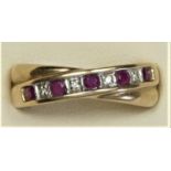 A 9ct gold ruby and diamond crossover band ring, M, 2.9gm