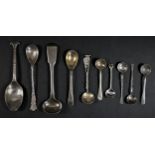 A collection of silver condiment spoons, including St. Peters Cathedral, Montreal, 52gm