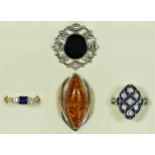 A 9ct gold three stone blue and white stone ring, O 1/2, 2.6gm, a silver and amber ring, a silver