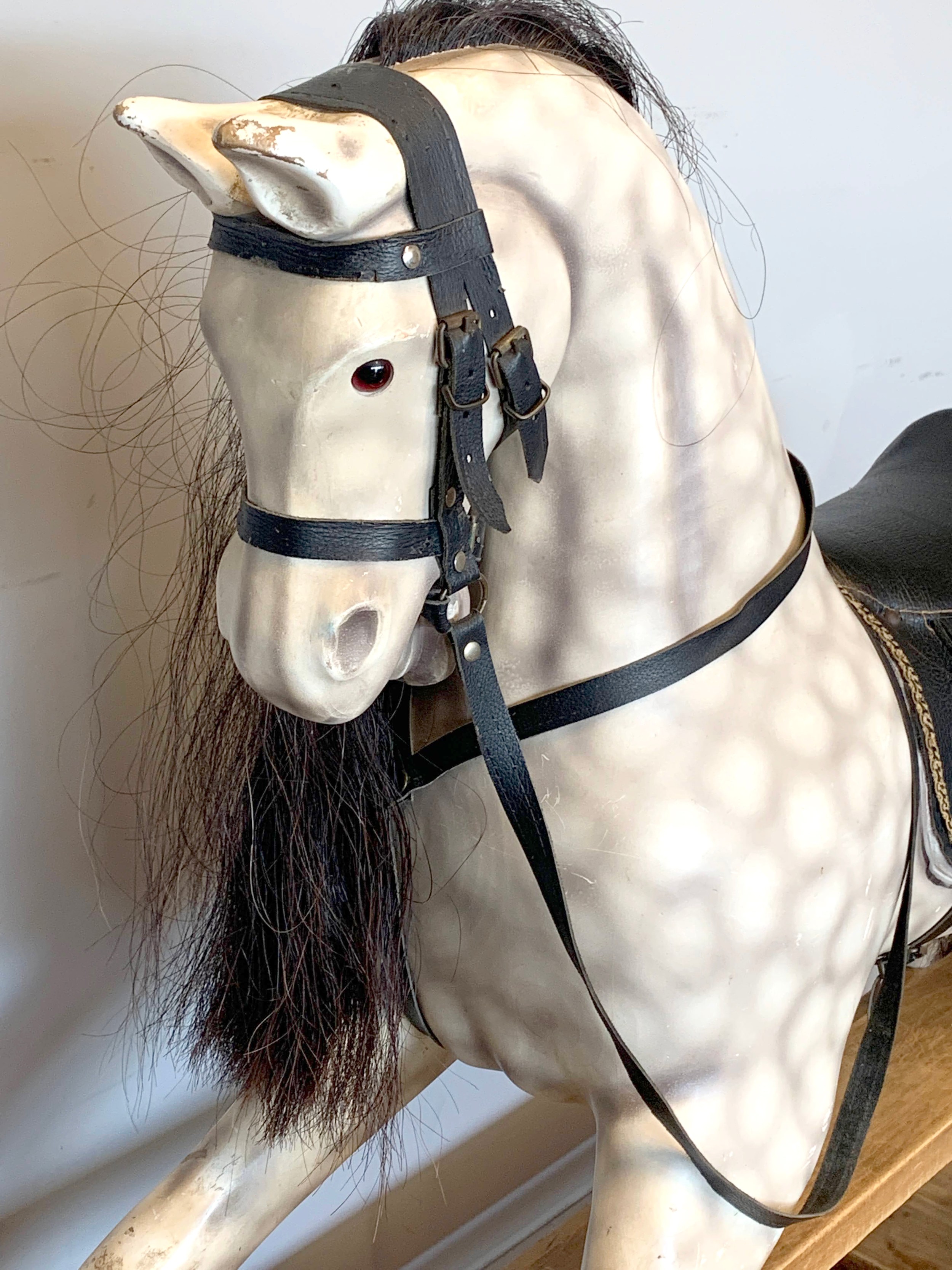 A large child's painted wood rocking horse, finished in a dapple grey with black leather saddlery, - Image 4 of 6