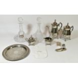 A silver plated four piece coffee/tea service, together with a pair of cut glass ships decanters,