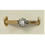 A 9ct gold single stone illusion set diamond ring, N 1/2, 2.1gm