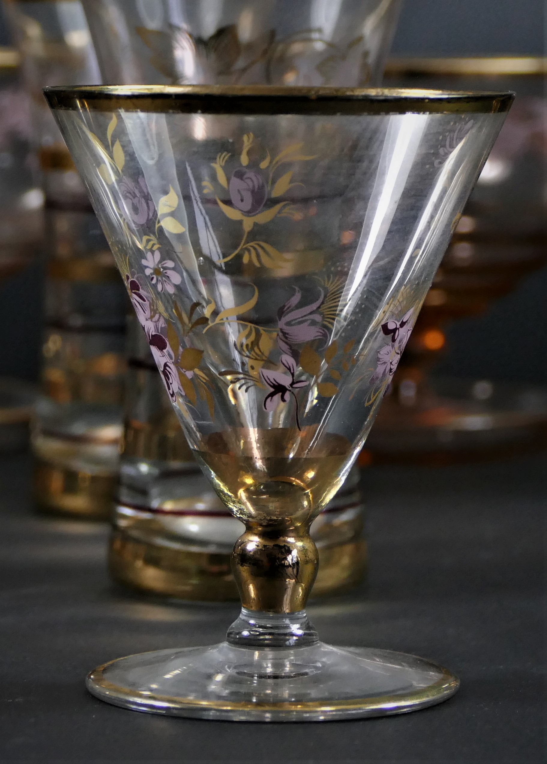 A collection of mid 20th Century glassware, gold banded with hand painted floral decoration, to - Image 2 of 2