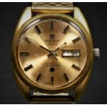 Tissot Seastar, a gilt metal day/date gentleman's wristwatch, 34mm, presentation inscription dated