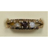 A 9ct opal and garnet three stone ring, textured mount, M, 2.6gm