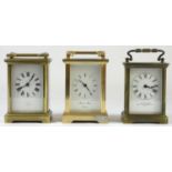 Two French brass cased 8 day carriage clocks, together with an English example, complete with