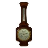 A Regency style combination wall barometer, aneroid with silvered dials and walnut veneered inlaid