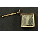 A 14K gold emergency $1 note charm, 3.5gm