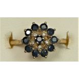 A 9ct gold sapphire and diamond cluster ring, M, 2.4gm