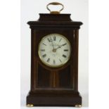 A Knights & Gibbins mahogany cased bracket clock, having a jeweled Franz Hermle 8 day movement