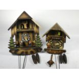 A 1970's German Black Forest cuckoo clock, having carousel and articulated dancing figures, 1 day