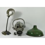 A 'Strand Electric' industrial theatre studio spot light, c1950s, together with a 1930s cast iron