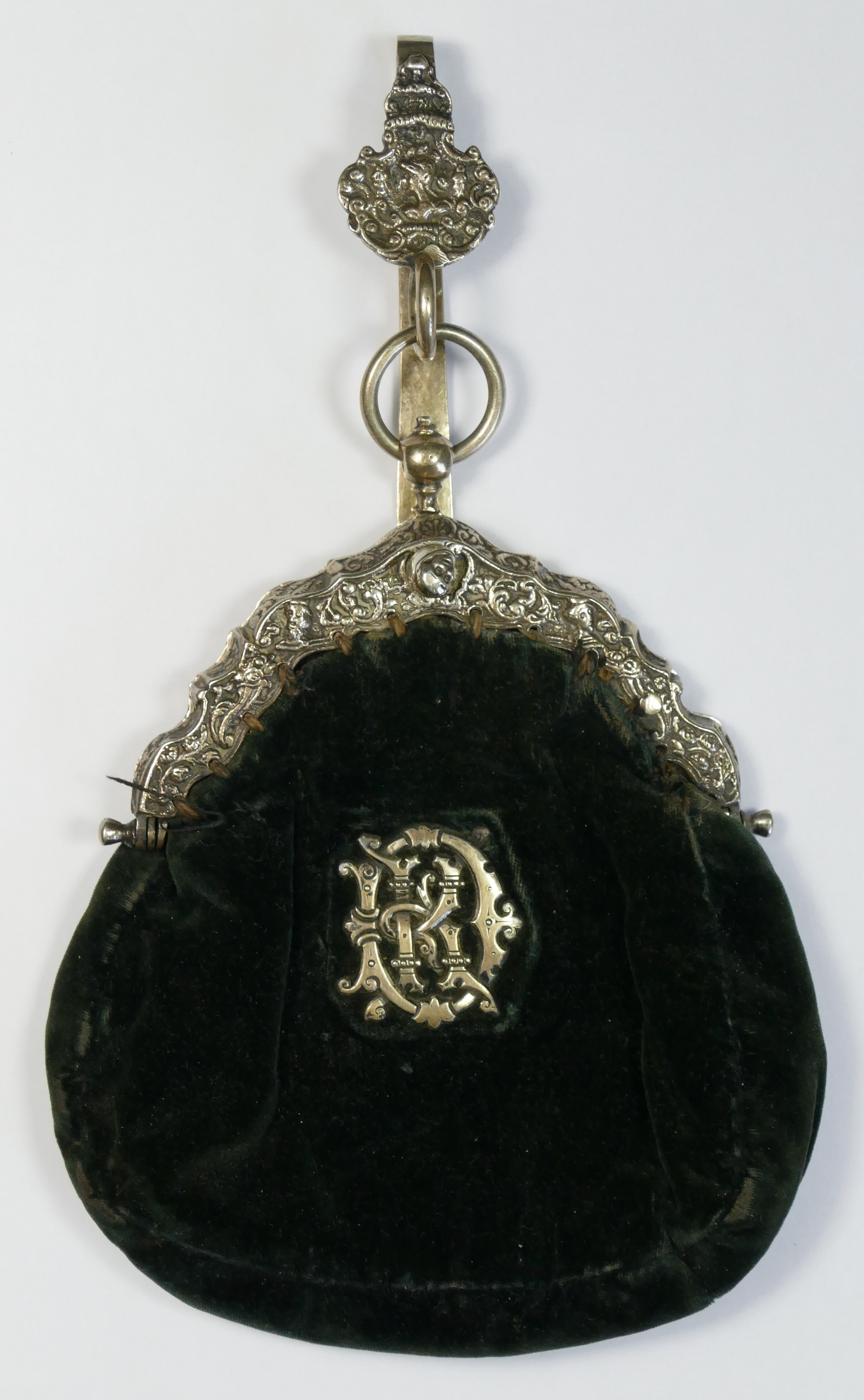 A Dutch silver mounted velvet purse, control marks, date letter for 1882, with belt mounting holder,