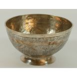 A 19th century Persian silver bowl, with floral chased decoration, 15cm, 260gm