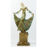 An Austrian Art Deco table strike lighter, after Josef Lorenzl, cold painted spelter, depicting a