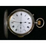 A silver keyless wind full hunter quarter repeating and stop second pocket watch, Chester 1927,