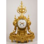 Samuel Marti et Cie, Paris, a late 19th century French ormolu mantel clock, the white enamel dial