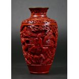 A Chinese carved cinnabar baluster vase, with blue enamel interior, 15.5cm