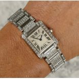Cartier Tank Francaise, a stainless steel and later diamond set ladies quartz wristwatch, c.2010,