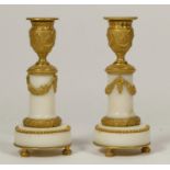 A pair of 19th century style white marble and gilt metal candlesticks, 16cm