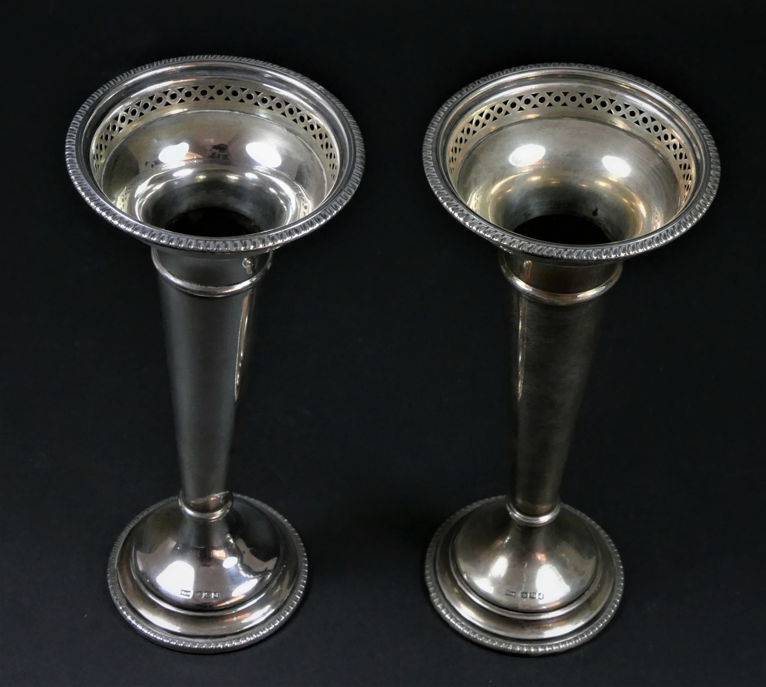 A silver pair of tapering vases, by Walker & Hall, Sheffield 1921, with pierced rim and gadrooned - Image 2 of 4