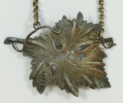 A George IV silver PORT label, by Charles Boyton, London 1828, in the form of a vine leaf, 8 x 6cm