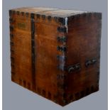 Of Indian Civil Service interest; a Victorian large oak and iron bound slightly domed silver