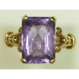 A 9ct gold amethyst dress ring, claw set with a multi-faceted rectangular stone, 14 x 10mm, ornate