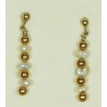 A pair of rice pearl and 9ct gold ear pendants.
