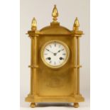 Japy Freres, Paris, a late 19th century gilt brass presentation mantel clock, white enamel dial with