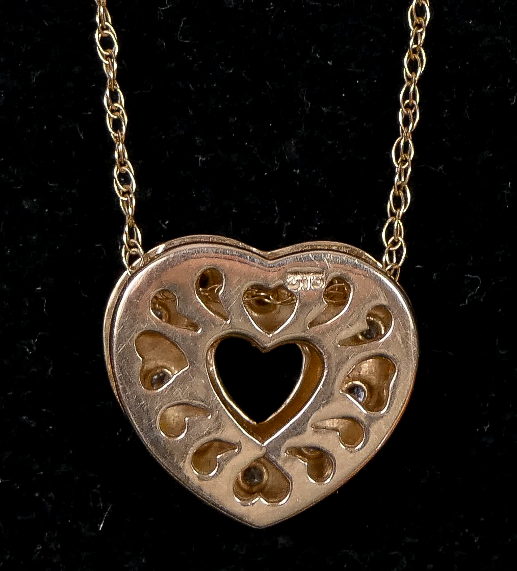 A 9ct gold openwork matt finish heart pendant, inset with ten diamonds, 15 x 14mm, chain, 3.1gm - Image 2 of 2