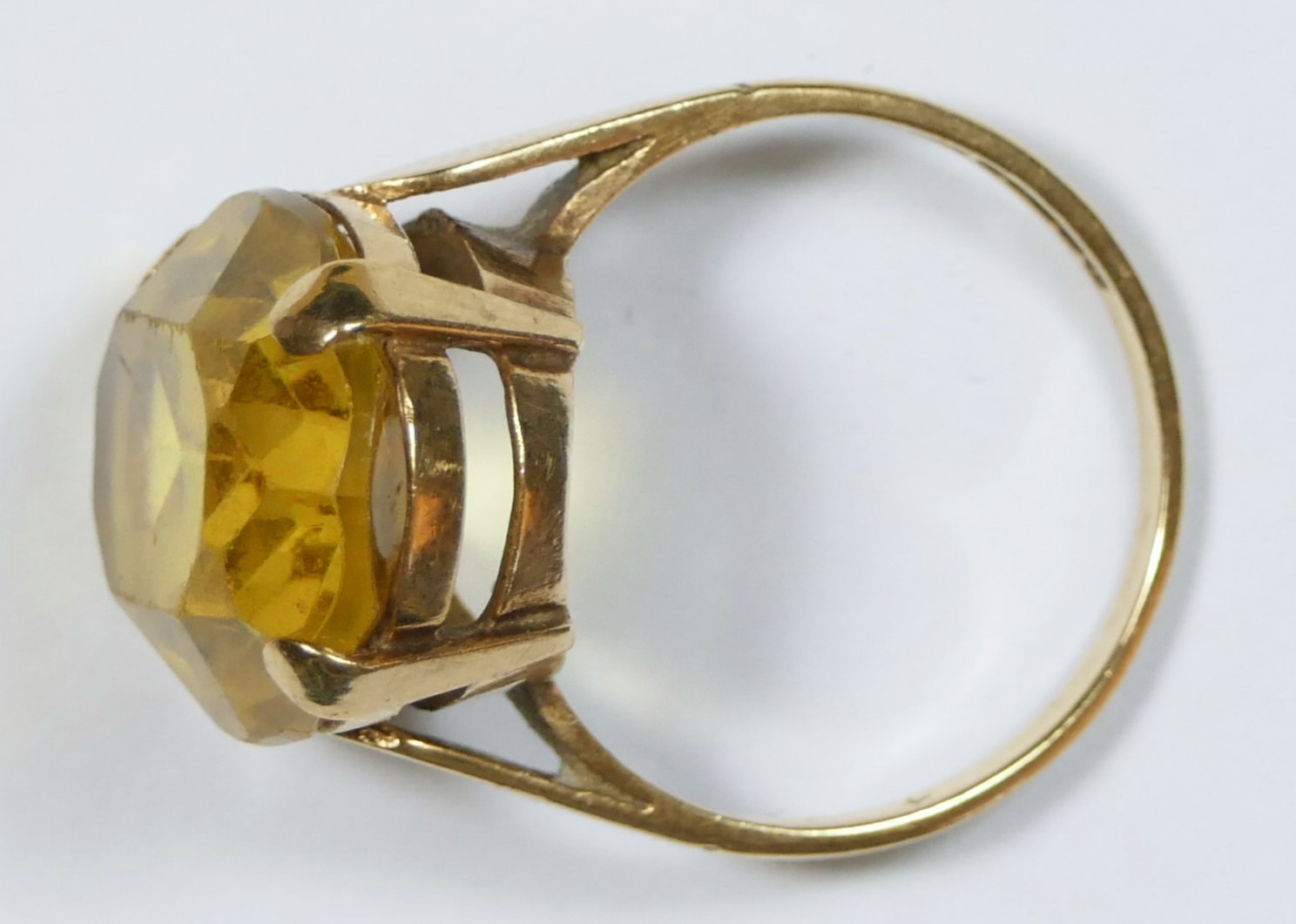 A 9ct gold citrine ring, Birmingham 1968, claw set with an oval mixed cut stone, 18 x 14mm, R, 6.5gm - Image 2 of 2