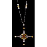 An 18ct gold and platinum yellow and white diamond star pendant, by DICG, claw set with four kite