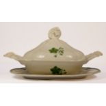 A Brameld lidded oval tureen, 34 x 24 cm, with a green leaf border together with a matching side