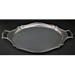 An oval silver two handled tray, by Roberts & Belk, Sheffield 1925, with wavy border, 67 x 42cm,