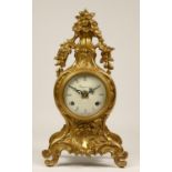 An Italian brass 8 day Louis XIV style mantel clock, with basket of flowers surmount, German Franz