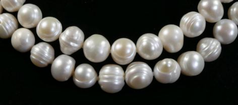 A freshwater pearl necklace of Opera length, beads 8 - 10mm, 155cm