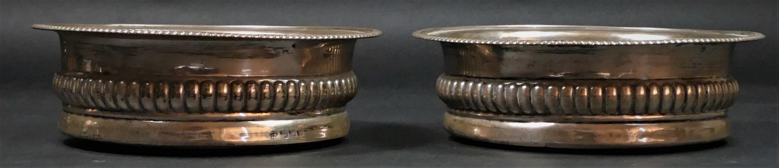 A George III Provincial silver pair of bottle coasters, by Robertson & Watson, Newcastle c.1808, - Image 3 of 5