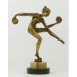 A 20th Century brass figurine of a dancing flapper girl, stood upon a stepped circular marble