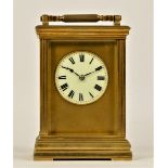 A late 19th century brass striking carriage clock, Roman numerals, striking the hours and half on