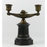 A late 19th/early 20th century candelabra, bronzed cast metal on a black slate column (later