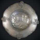 An Italian Art Nouveau pewter charger, by Achille Gamba, circa 1900, the central well cast in