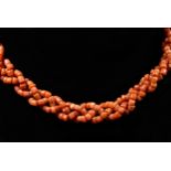 A Victorian rope twist coral bead necklace, beads approximately 3mm each, 52cm