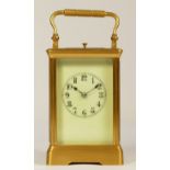 A late 19th century brass striking carriage clock, Arabic numerals, striking the hours and half on a